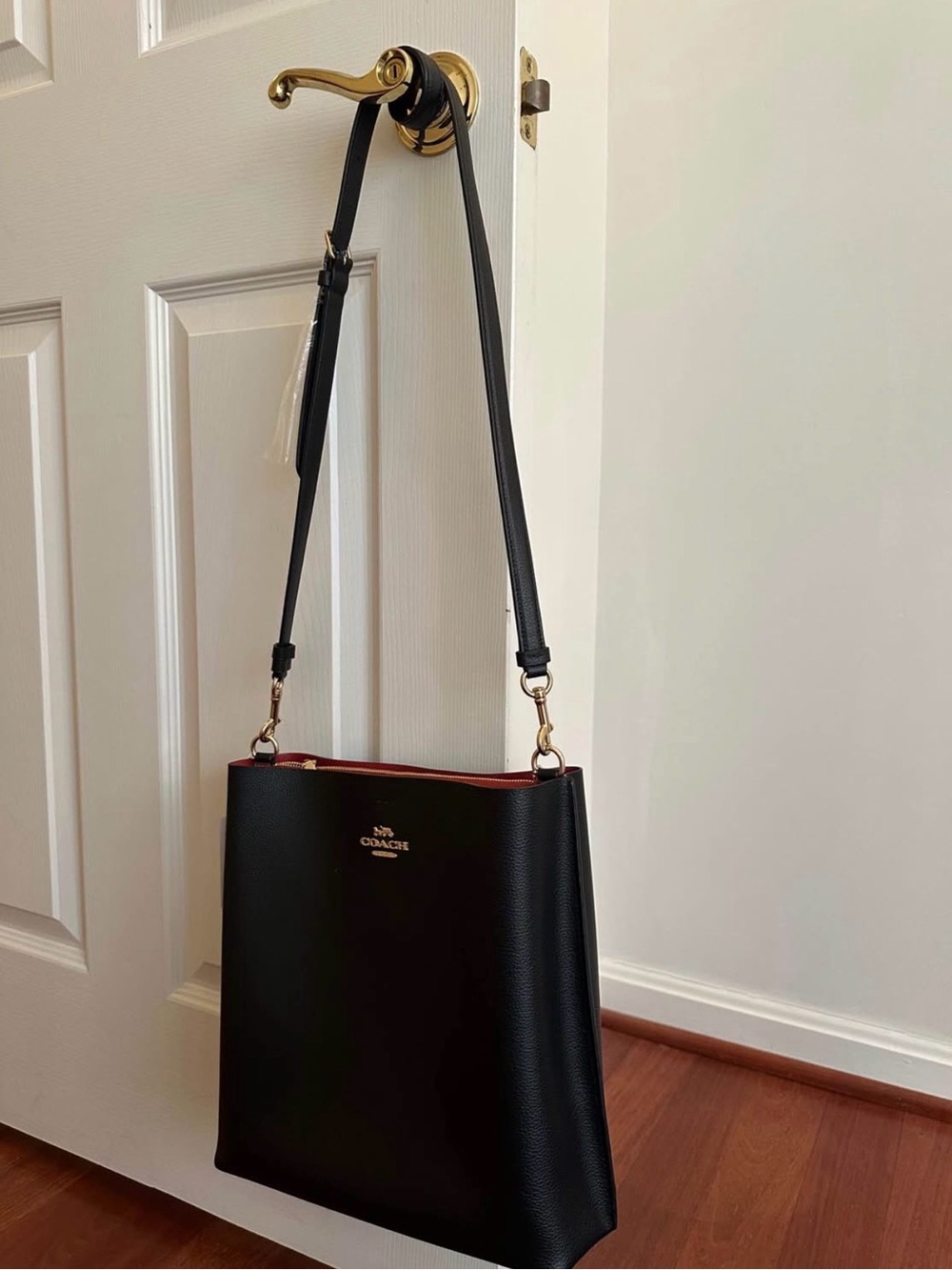 COACH Black Shoulder Bag with Red Trim and Gold Hardware